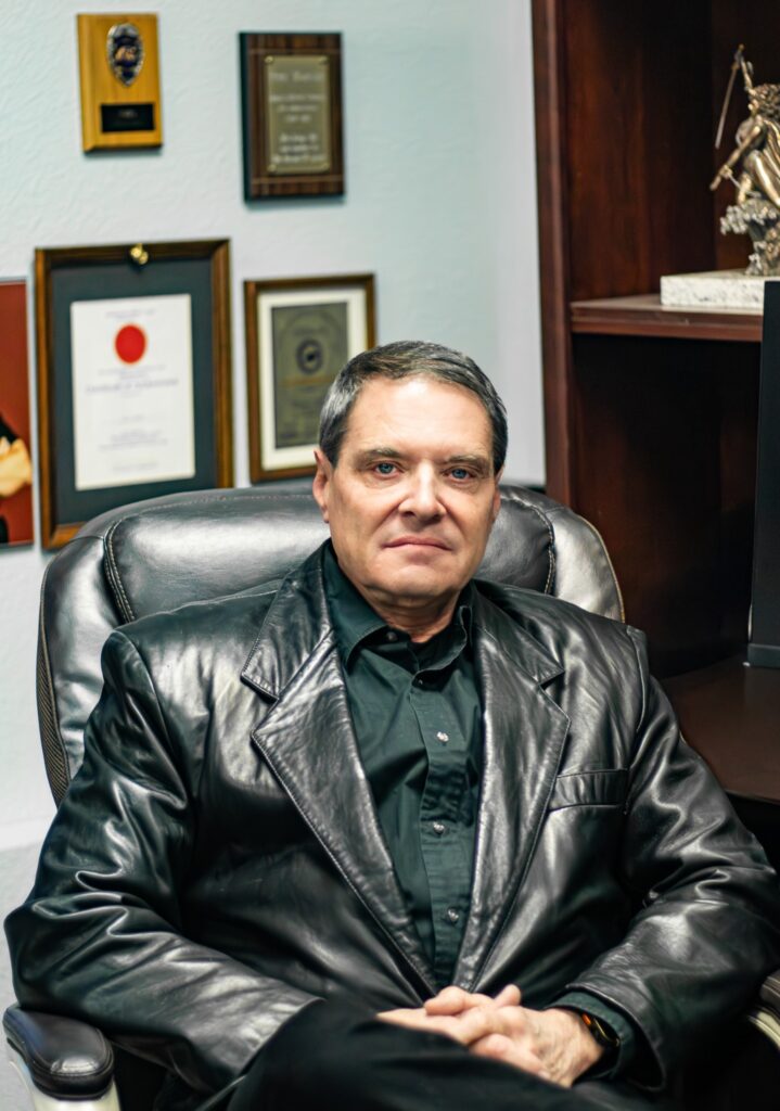 Rick D Wagner, attorney, seated in his office