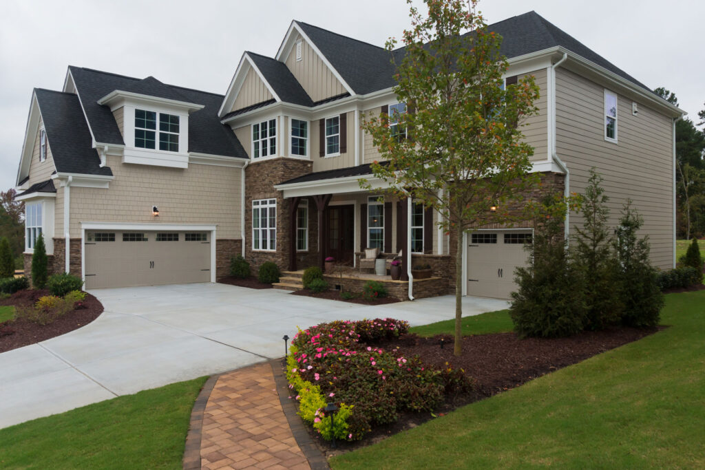 Photo of newly constructed house - Additions and Garages