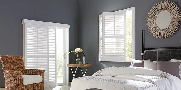 A photo of a busines woman, possibly blind or visually impaired, smiling and looking confident.