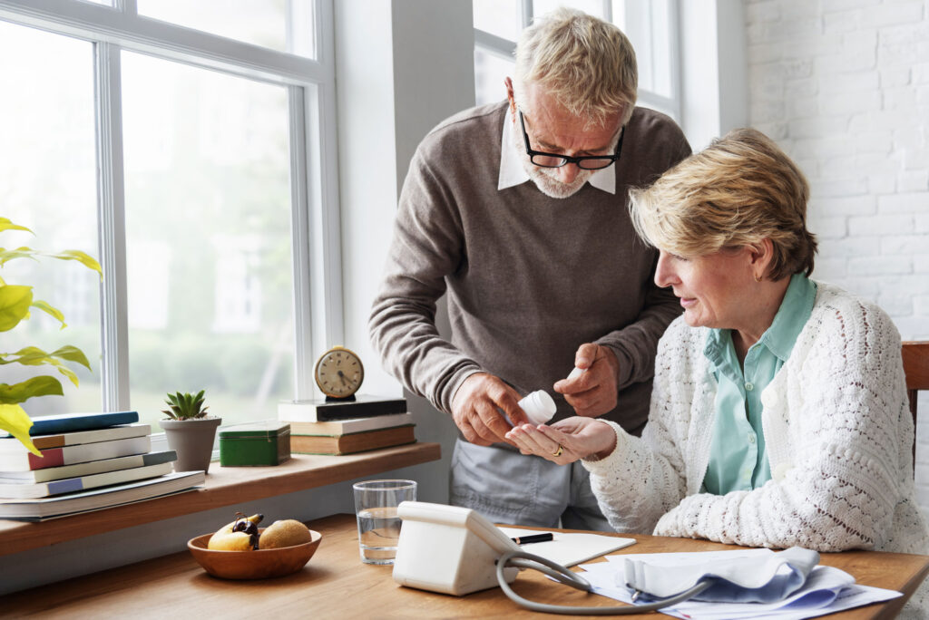 Senior Adult Taking Pills Medicine