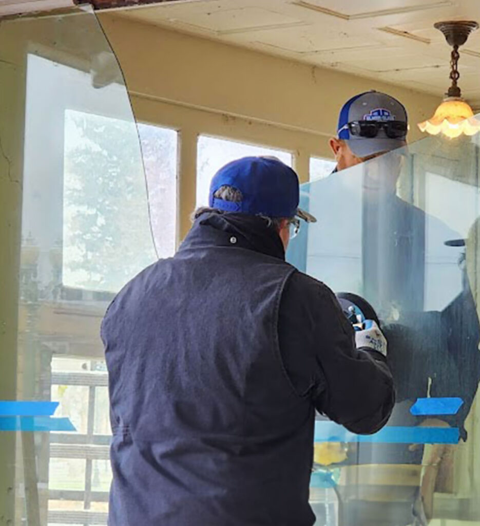 careful-removal-of-broken-plate-glass