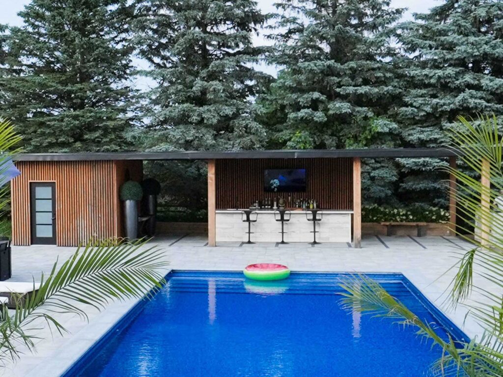 Cabana with palms for tropical oasis near pool