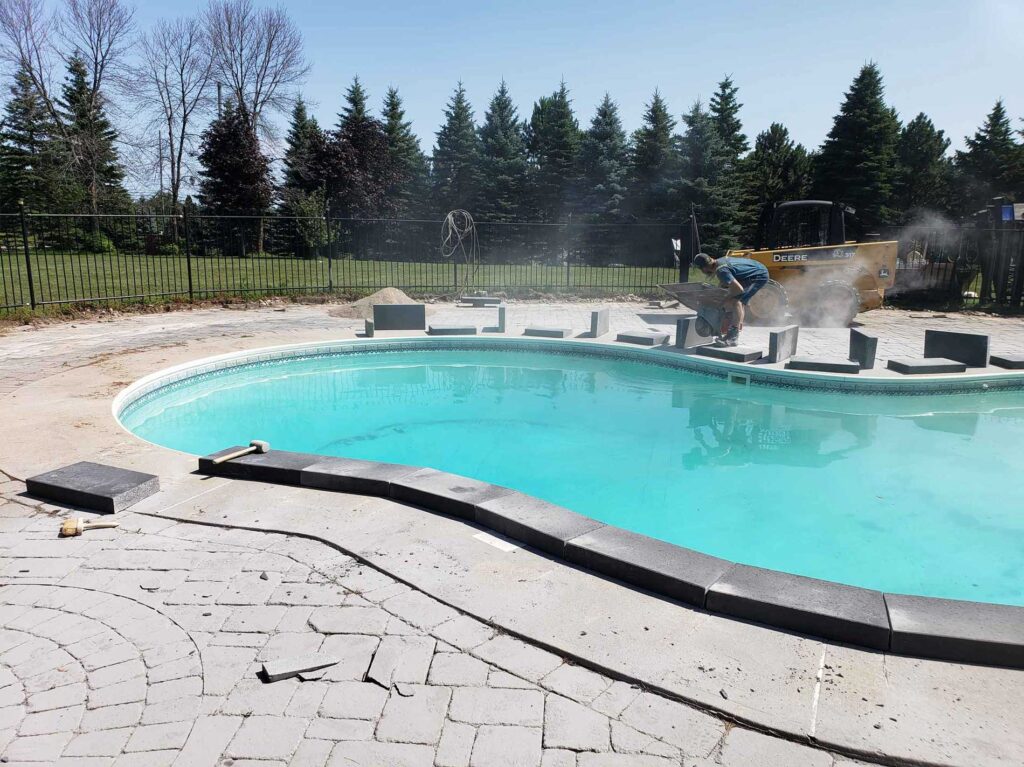 StoneKings working on Pool coping installation