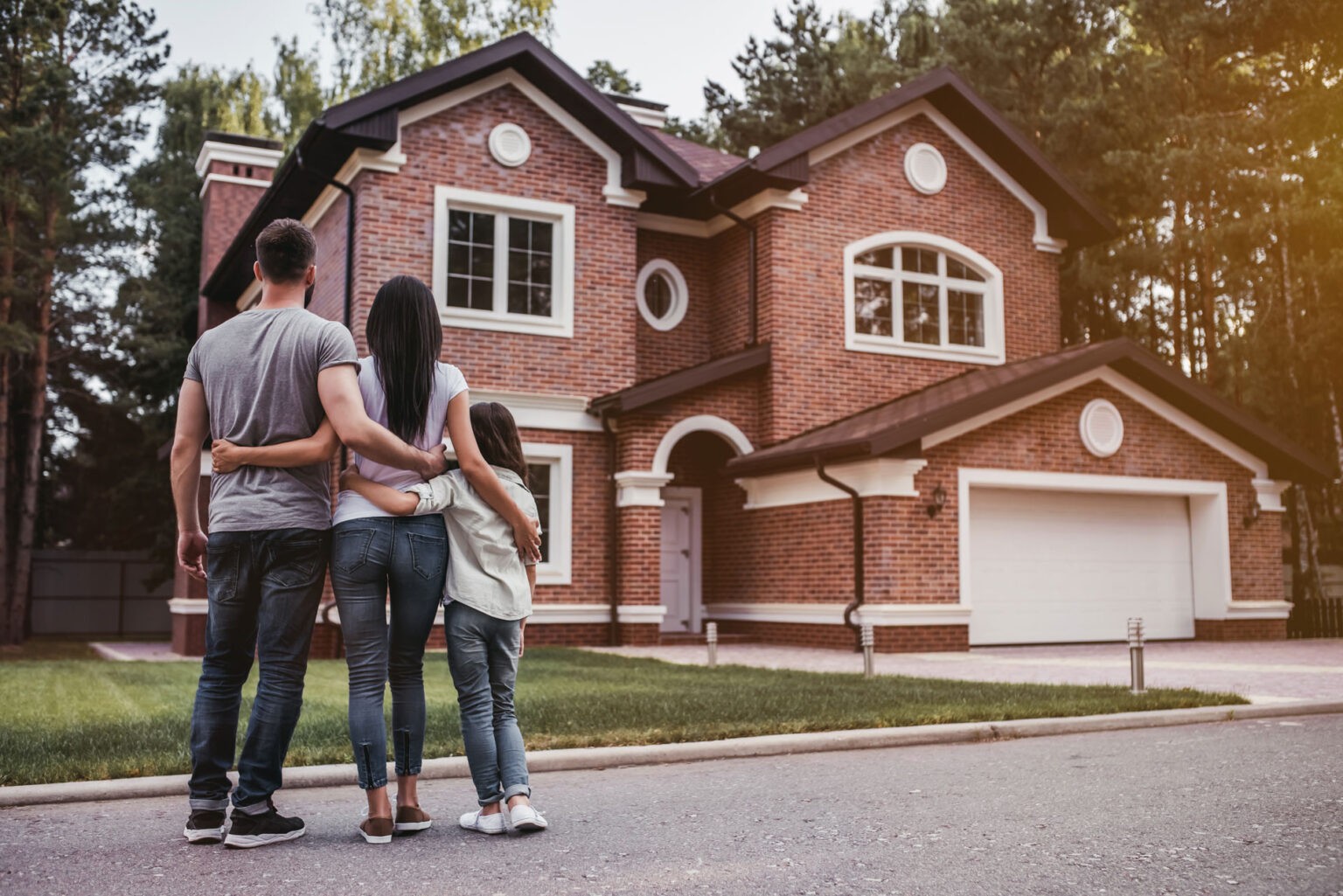 Image of a person standing next to a car.