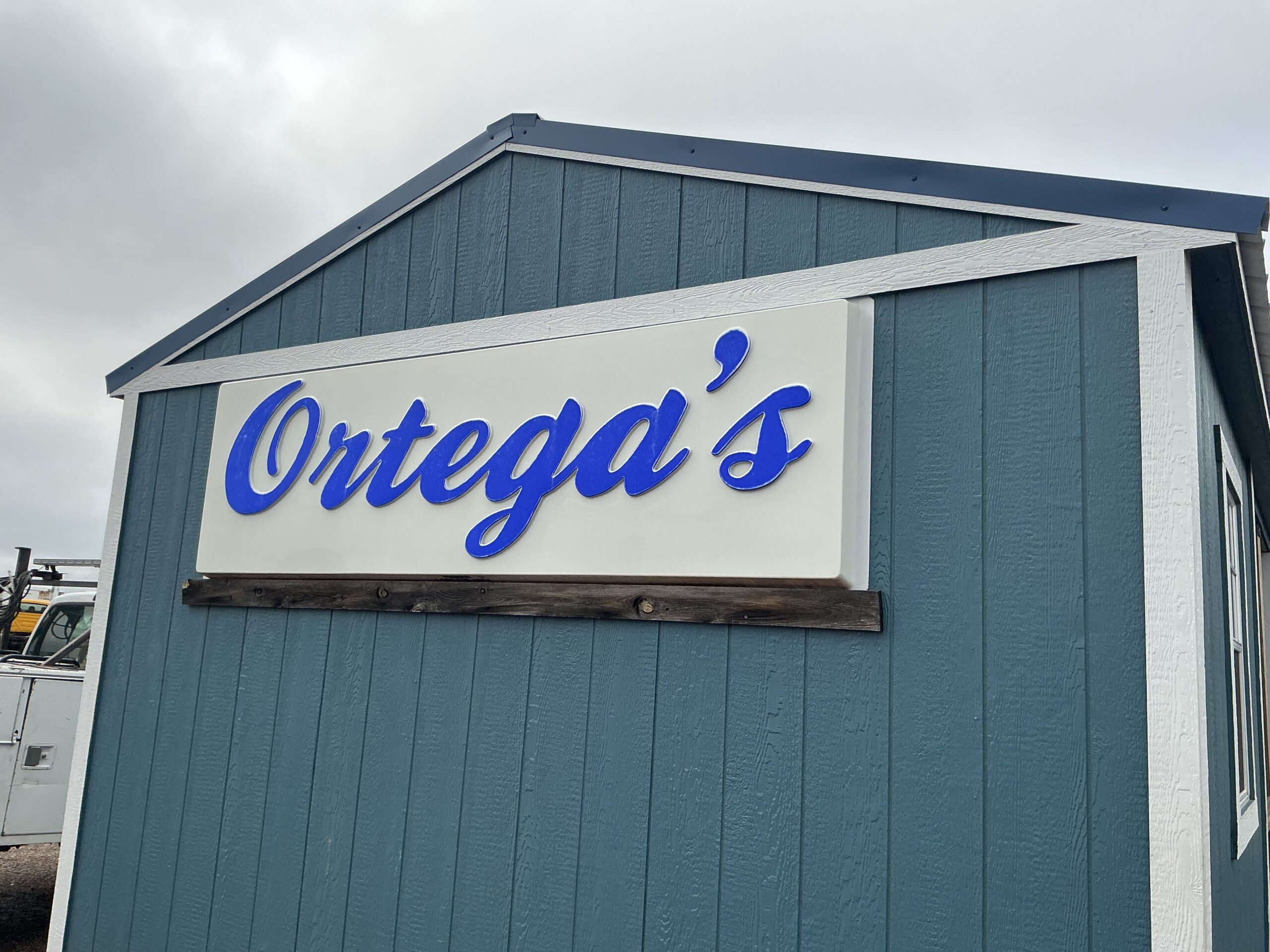 Ortega's Wrecker Service & Auto Repair logo