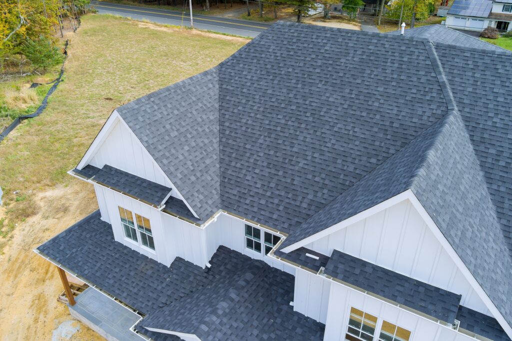 Javen Simon Roofing Ltd aerial view of a home with dark shingle roof
