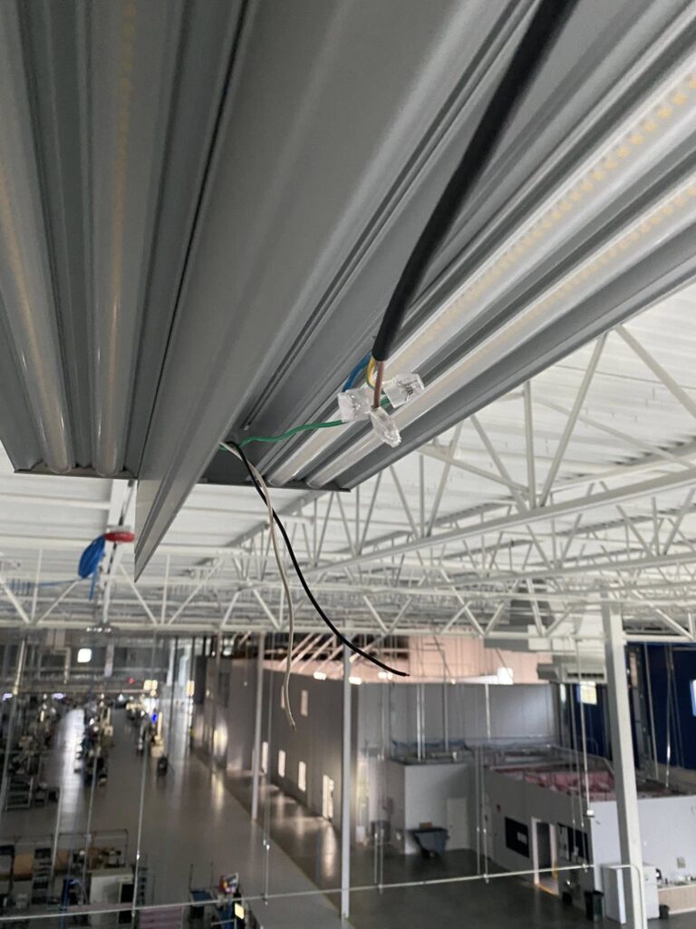 L&C Electric Inc. electrical wiring installation with LED lighting fixtures in commercial ceiling