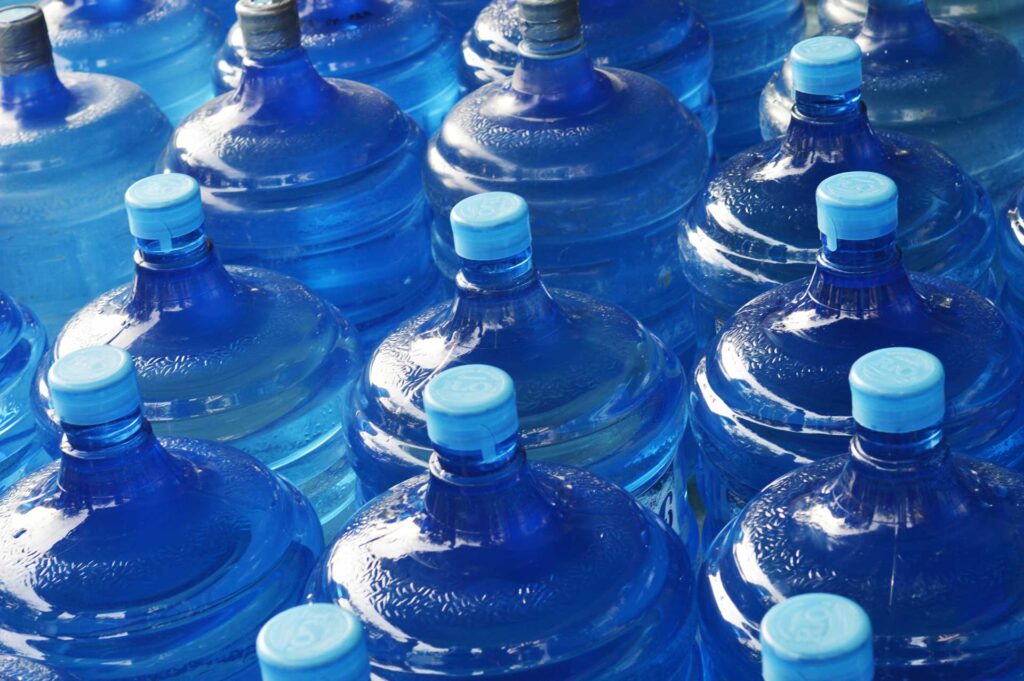 blue transparent water gallon container
