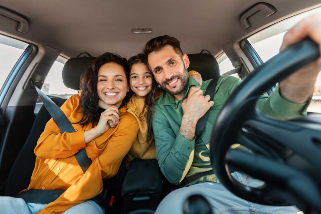 Cole Insurance Agency LLC family smiling in a car