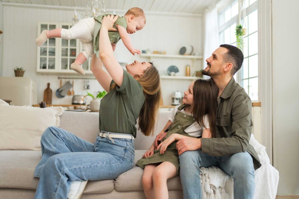 Cole Insurance Agency LLC family insurance image of parents and children spending quality time at home