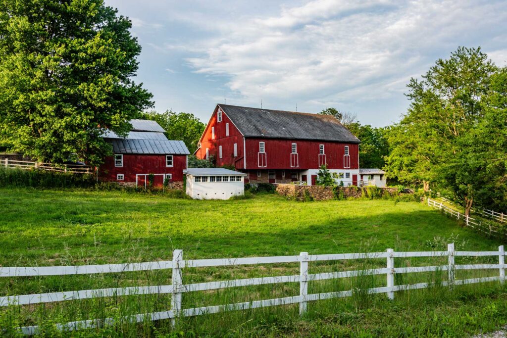 Cole Insurance Agency LLC farm property with red barn and green landscape