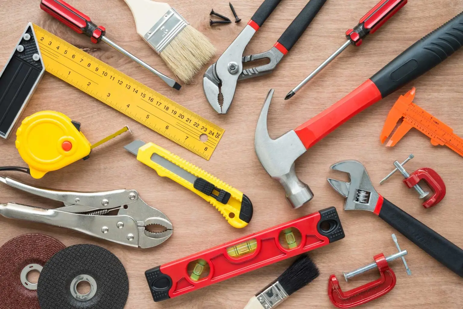Flat lay of vary many set of hardware tools equipment, home DIY, fix repair, building construction, garage, carpenter, technician on wooden board background. Tools shop, hardware house, DIY concept.
