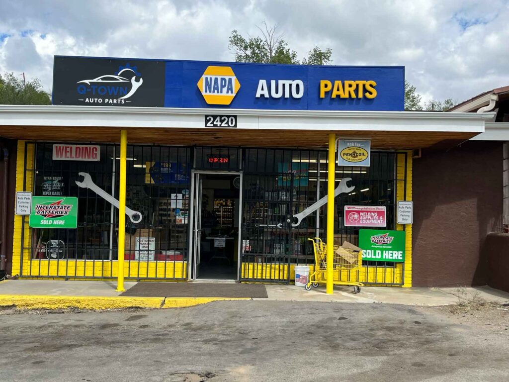 Q-Town Auto Parts store front with NAPA AUTO PARTS signage