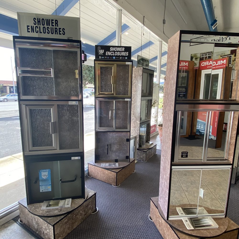 Mid Coast Glass showroom displays shower enclosures and glass doors