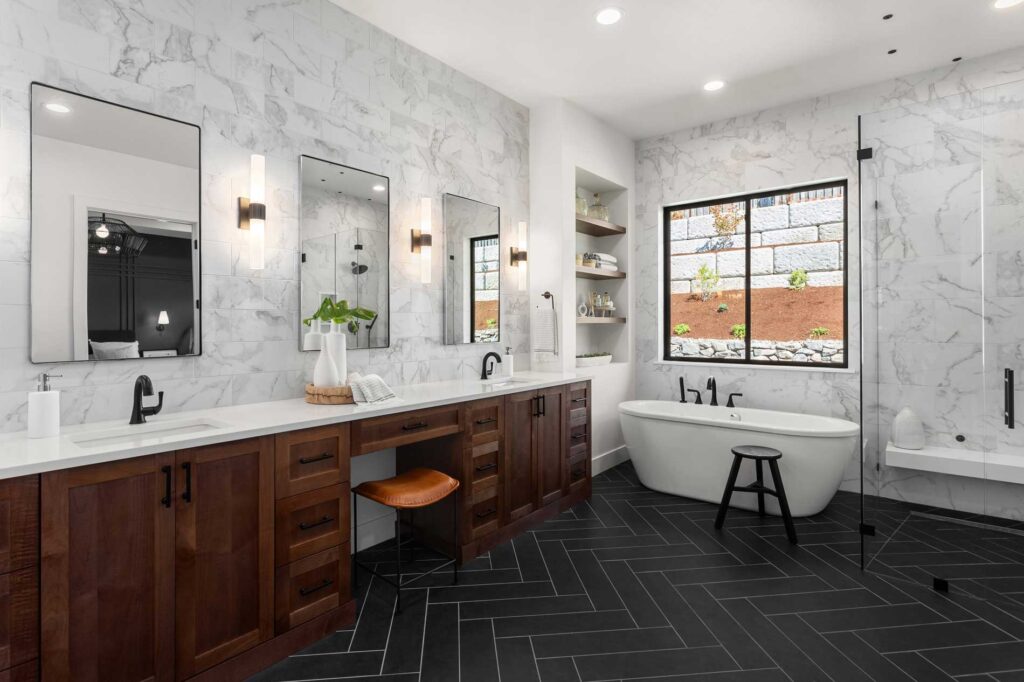 Mid Coast Glass modern bathroom with custom glass shower doors, mirrors, and window