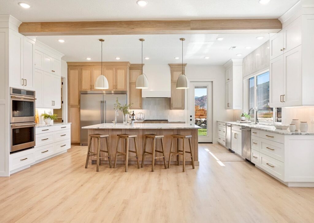 Barney Bros Electric Inc. kitchen electrical lighting installation in a modern white and wood kitchen