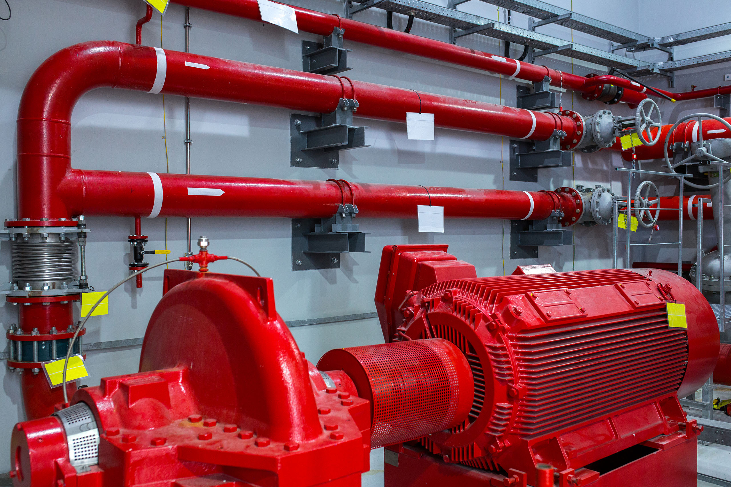 Fire protection sprinkler and fire suppression system piping in a mechanical room by Mid-Coast Fire Protection