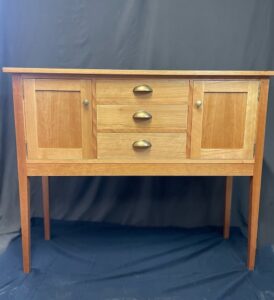 Jim's Wood Furniture & CNC Routing wooden sideboard cabinet with three drawers and brass handles