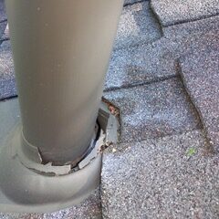 Propst Enterprises Inc. roof downspout with visible damage