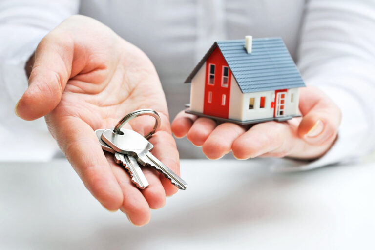 Real estate keys and house model for Barton County Title Co Inc.