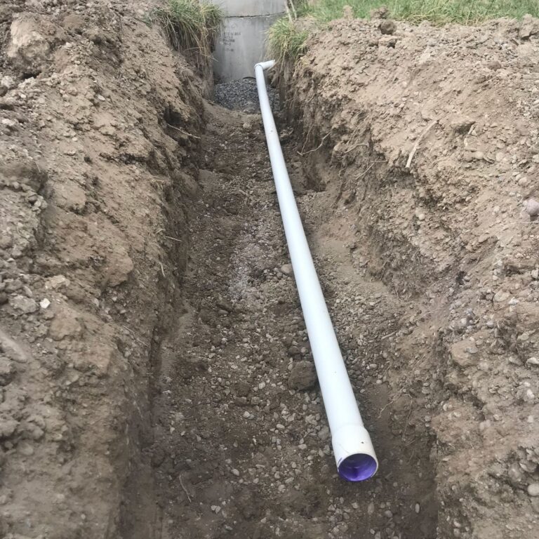 Excavation photo with a pipe laid out