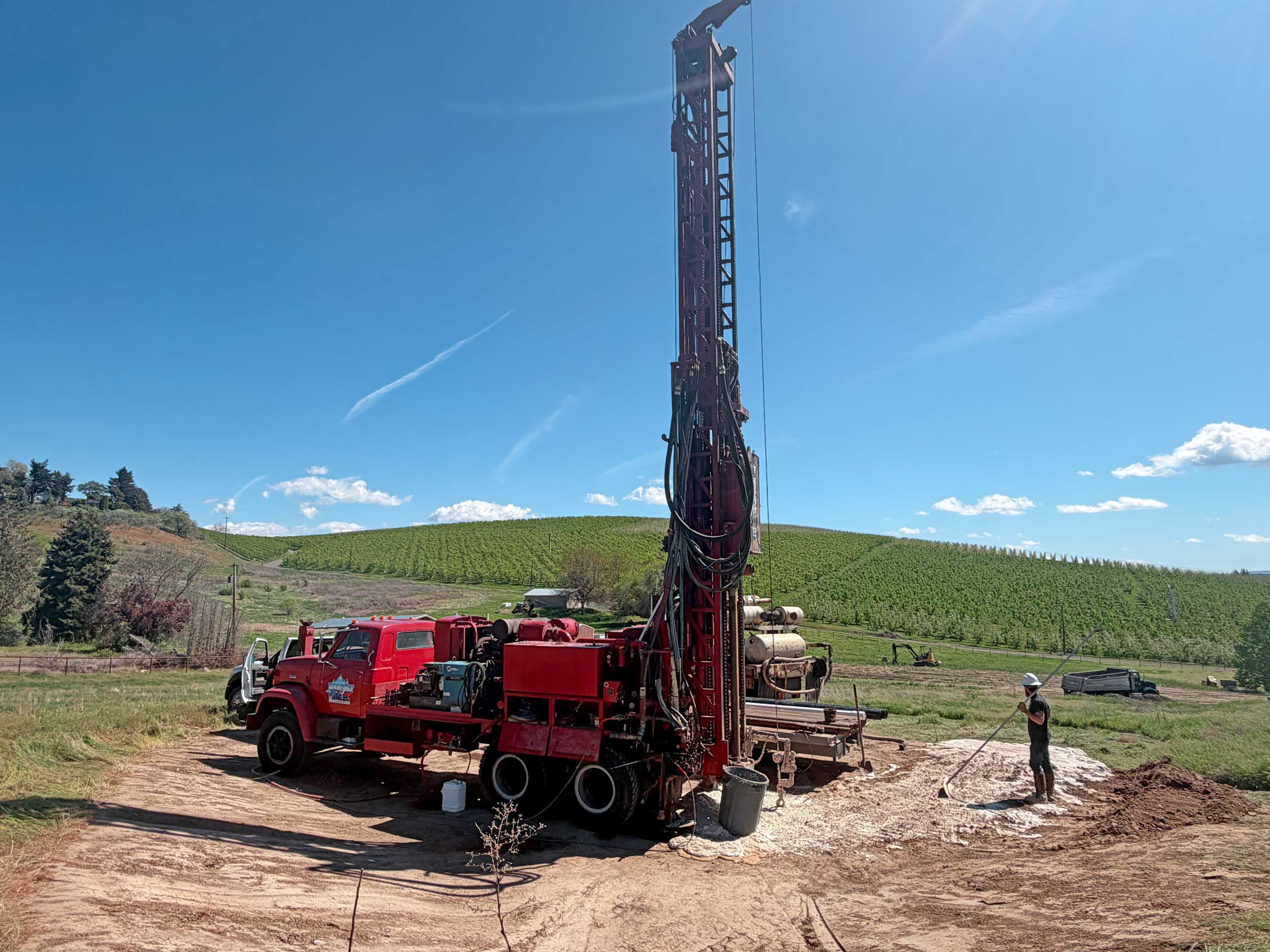 Wamsley Well Drilling Inc. drilling rig operating on a job site