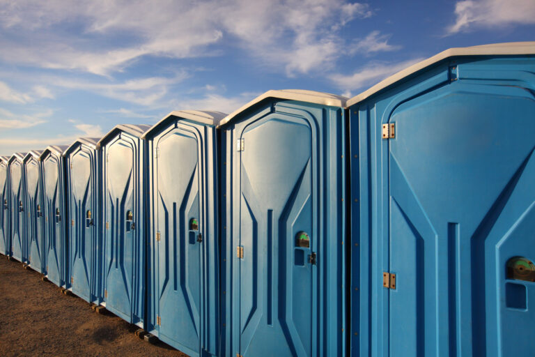 photo of Portable Toilets in a line - blue