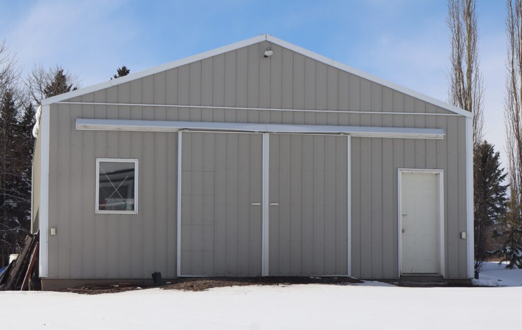 Construction Worker Lifting a Heavy Object