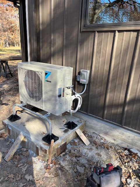 outside-unit-off-the-ground-on-metal-home