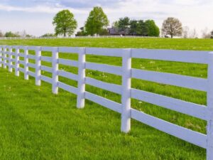 Photo of white split rail fence