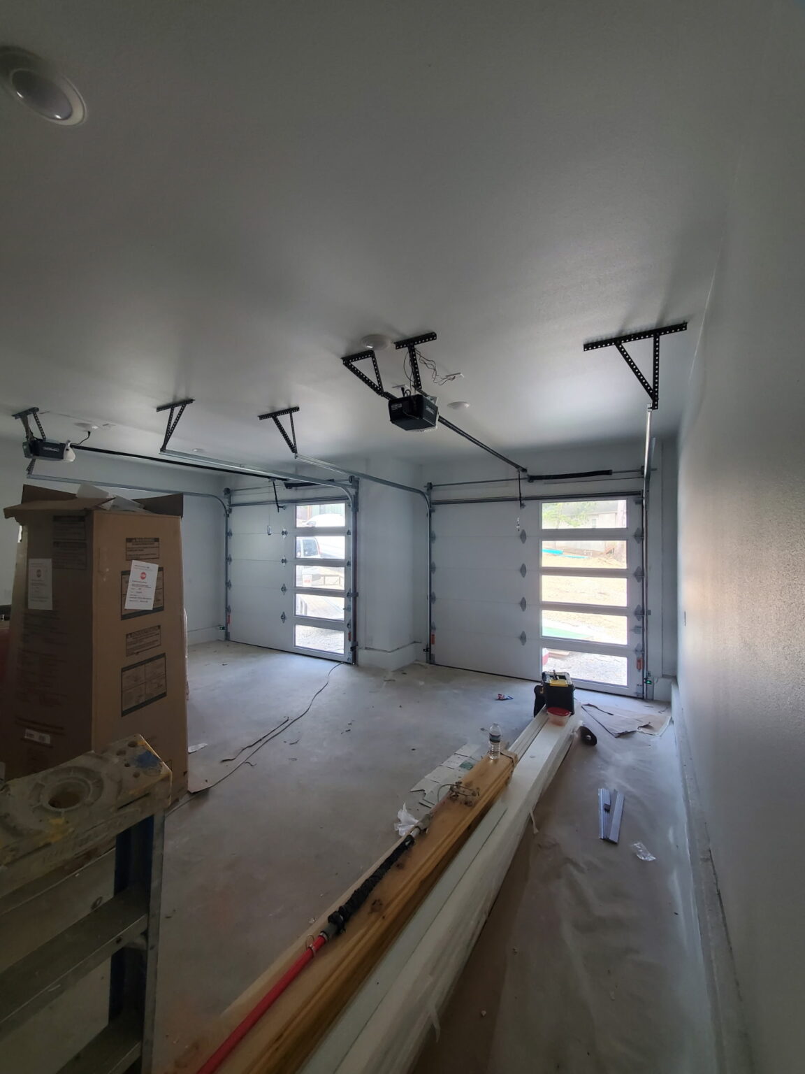 Modern garage 2 doors from inside looking out