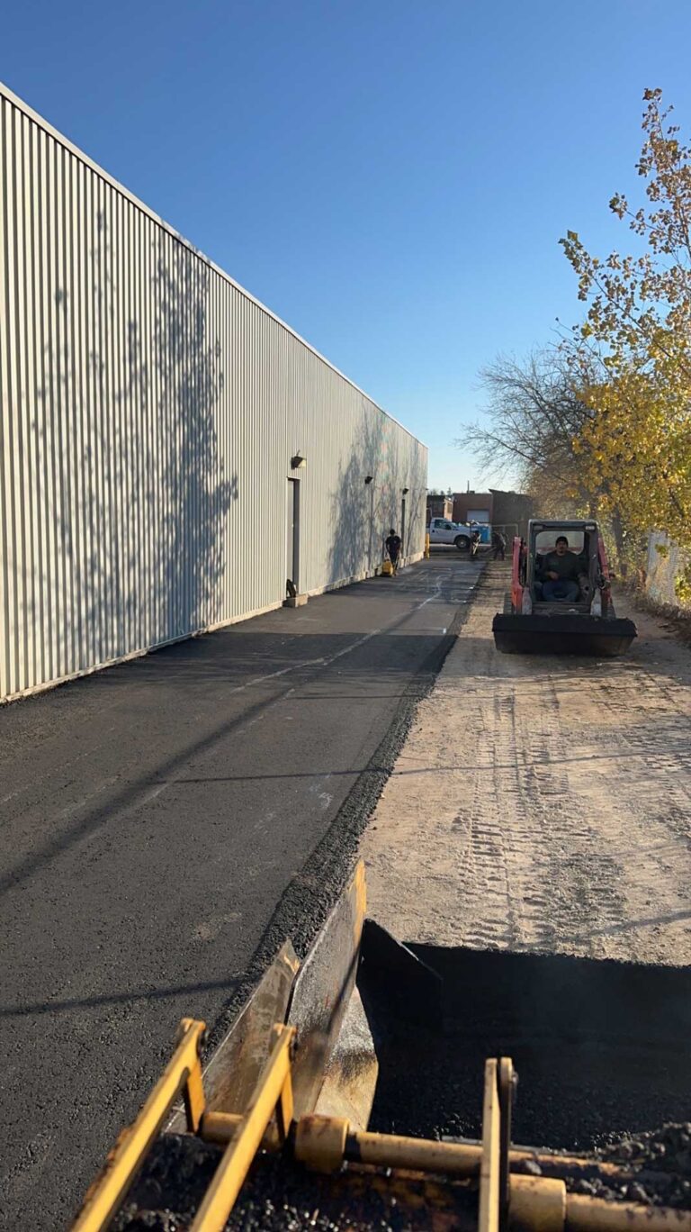 Paving around commercial industrial metal building