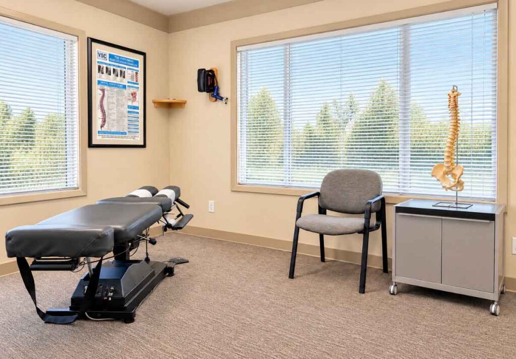 Boise Valley Chiropractic treatment room with chiropractic table and exam equipment