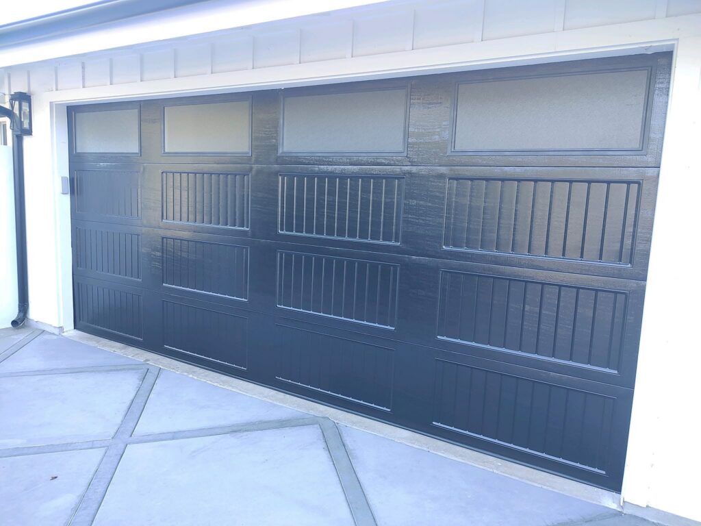 Pacific Overhead Door Service - modern dark gray sectional overhead garage door with windows