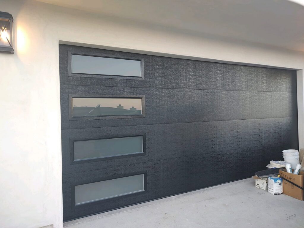 Pacific Overhead Door Service dark modern insulated garage door with windows