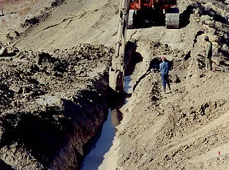 excavator digs minerals out of the ground
