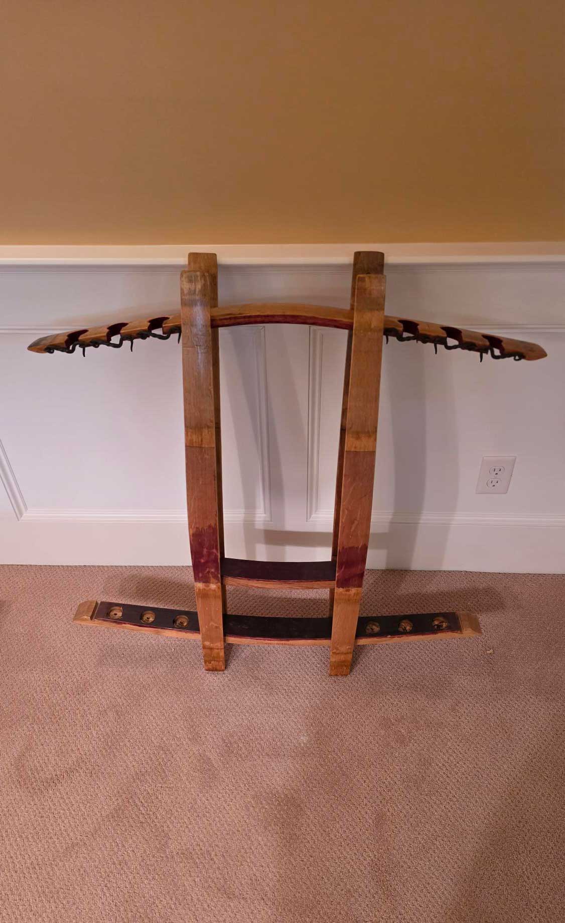 Unique Cue Rack made of wine barrels: $250